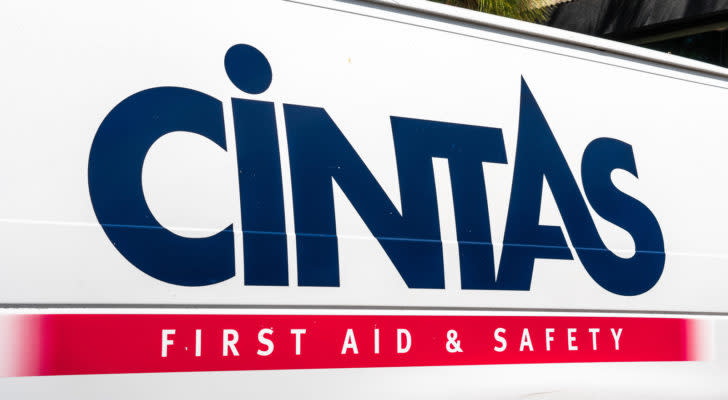 Image of the Cintas (CTAS) logo on the side of a white van.