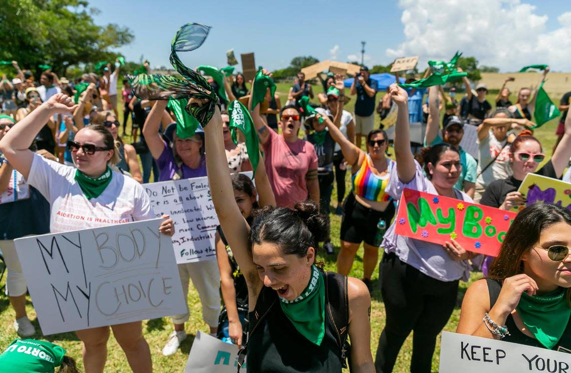 Rachel Fridman, bottom center, from North Miami Beach, chants while attending the “Bans Off Our Bodies” rally at Ives Estates Park in Miami on Saturday, May 14, 2022. The rally was held in opposition of the leaked draft opinion from the U.S. Supreme Court, which aims to overturn Roe v. Wade, removing women’s constitutional right to an abortion. In June, the court did overturn Roe.