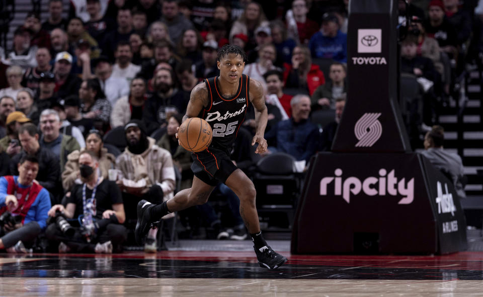 Detroit Pistons guard Marcus Sasser dribbles upcourt against the Portland Trail Blazers during the second half of an NBA basketball game Thursday, Feb. 8, 2024, in Portland, Ore. (AP Photo/Howard Lao)