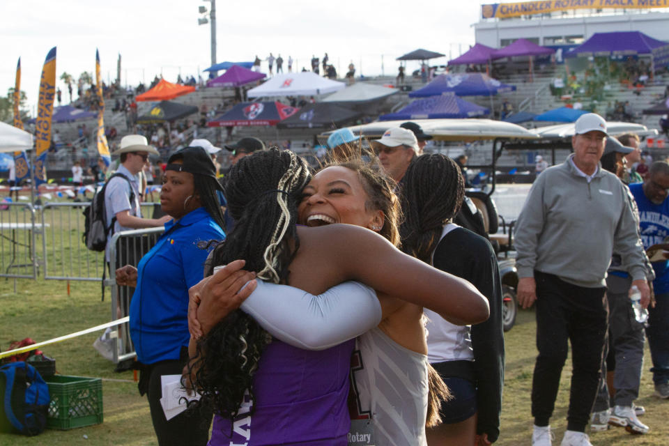 Kori Martin from Hamilton High School congratulates Cesar Chavez High School's Mayen Usoro on her win at Chandler High School on March 23, 2024.