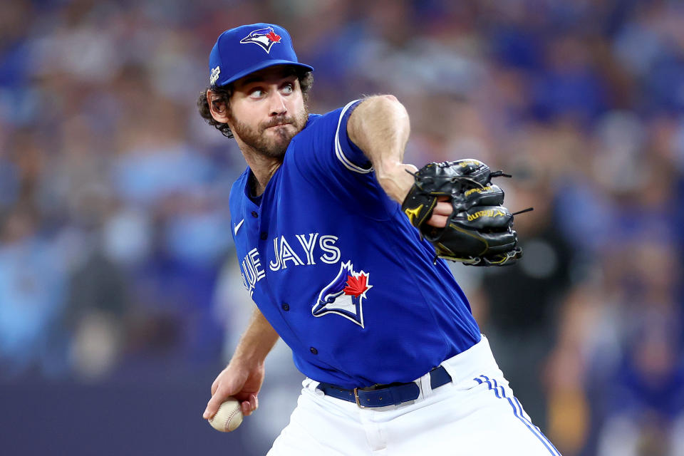 TORONTO, ONTARIO - OCTOBER 08: Jordan Romano #68 of the Toronto Blue Jays throws a pitch against the Seattle Mariners during the eighth inning in game two of the American League Wild Card Series at Rogers Centre on October 08, 2022 in Toronto, Ontario. (Photo by Vaughn Ridley/Getty Images)