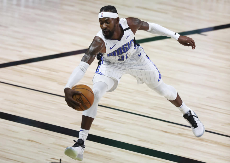 Terrence Ross tries to keep the ball inbounds. 