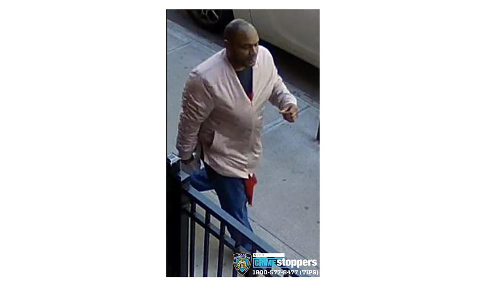 This image taken from surveillance video provided by the New York City Police Department shows a person of interest in connection with an assault of an Asian American woman, Monday, March 29, 2021, in New York. The NYPD is asking for the public's assistance in identifying the man. (Courtesy of New York Police Department via AP)