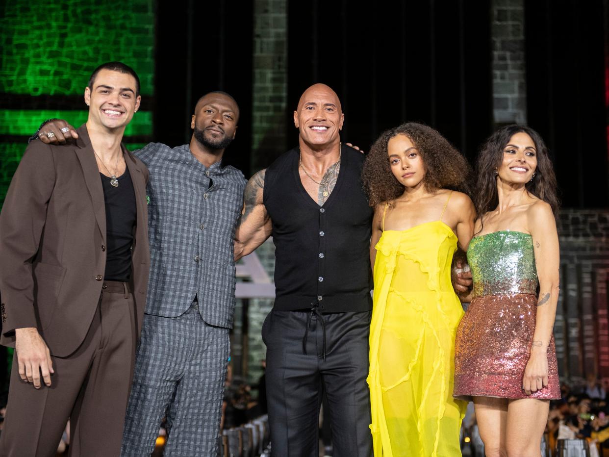 From left: Noah Centineo, Aldis Hodge, Dwayne Johnson, Quintessa Swindell, and Sarah Shahi promoting "Black Adam" in Mexico City in October 2022.