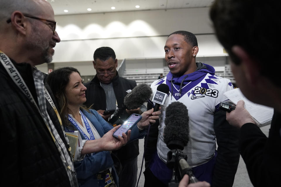 TCU running back Emari Demercado speaks to the media during a media day ahead of the national championship NCAA College Football Playoff game between Georgia and TCU, Saturday, Jan. 7, 2023, in Los Angeles. The championship football game will be played Monday. (AP Photo/Marcio Jose Sanchez)