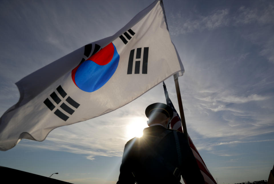 A member of the Honor Guard carries the South Korean flag after participating in the 2018 Security Consultative at the Pentagon, co-hosted by Defense Secretary Jim Mattis and South Korea Minister of Defense Jeong Kyeong-doo, Wednesday, Oct. 31, 2018. (AP Photo/Pablo Martinez Monsivais)