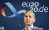 German Foreign Minister Heiko Maas holds a press conference following the informal talks of the EU Foreign Ministers in Berlin, Germany, Friday, Aug. 28, 2020. The topics of the so-called Gymnich meeting included developments in Belarus and the dispute over natural gas in the eastern Mediterranean between Turkey and the EU states of Greece and Cyprus. (Kay Nietfeld/dpa via AP)