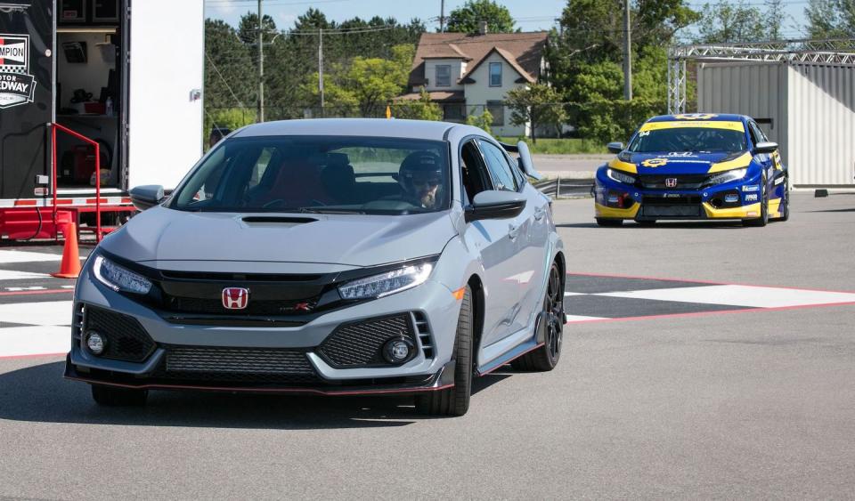 <p>The already wide Type R front fenders are punched out 2.9 inches to accept the race rubber.</p>