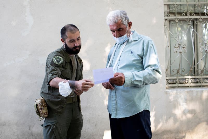 The Wider Image: Bordering Georgia's breakaway regions, villagers fear Russia's next steps