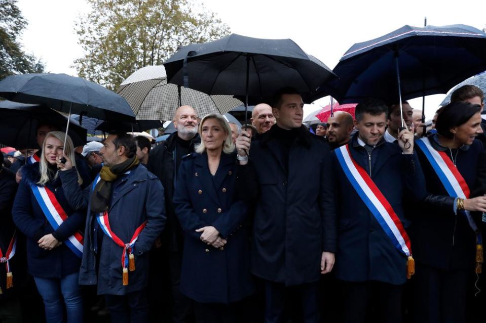 Le Pen and Bardella participate in a march against anti-Semitism from the Esplanade des Invalides to the Senate in Paris, on Nov. 12, 2023.<span class="copyright">Antoine Gyori—Corbis/Corbis/Getty Images</span>