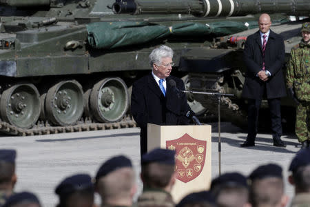Britain's Defence Secretary Michael Fallon speaks during the official ceremony welcoming the deployment of a multi-national NATO battalion in Tapa, Estonia, April 20, 2017. REUTERS/Ints Kalnins