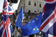 Members of the British In Italy group take part into a demonstration in support of the European Union in Rome, Saturday, March 25, 2017, the day leaders of the European Union gathered in Rome to mark the 60th anniversary of the bloc. (AP Photo/Gregorio Borgia)