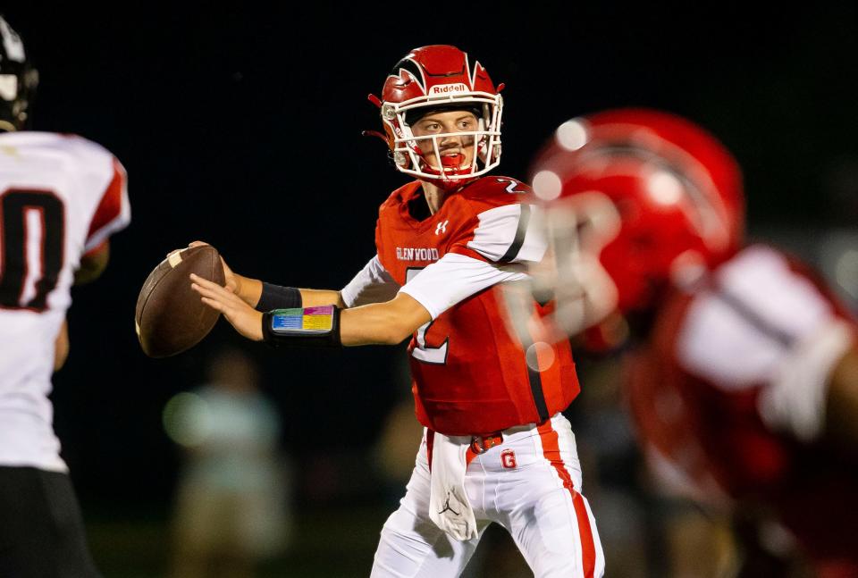 Glenwood's Jack Knudson (2) looks for an open receiver against Springfield in the second half at Glenwood High School in Chatham, Ill., Friday, August 27, 2021. [Justin L. Fowler/The State Journal-Register] 