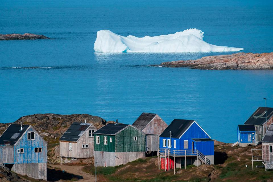 Icebergs float behind Kulusuk in Greenland on Aug. 16, 2019.