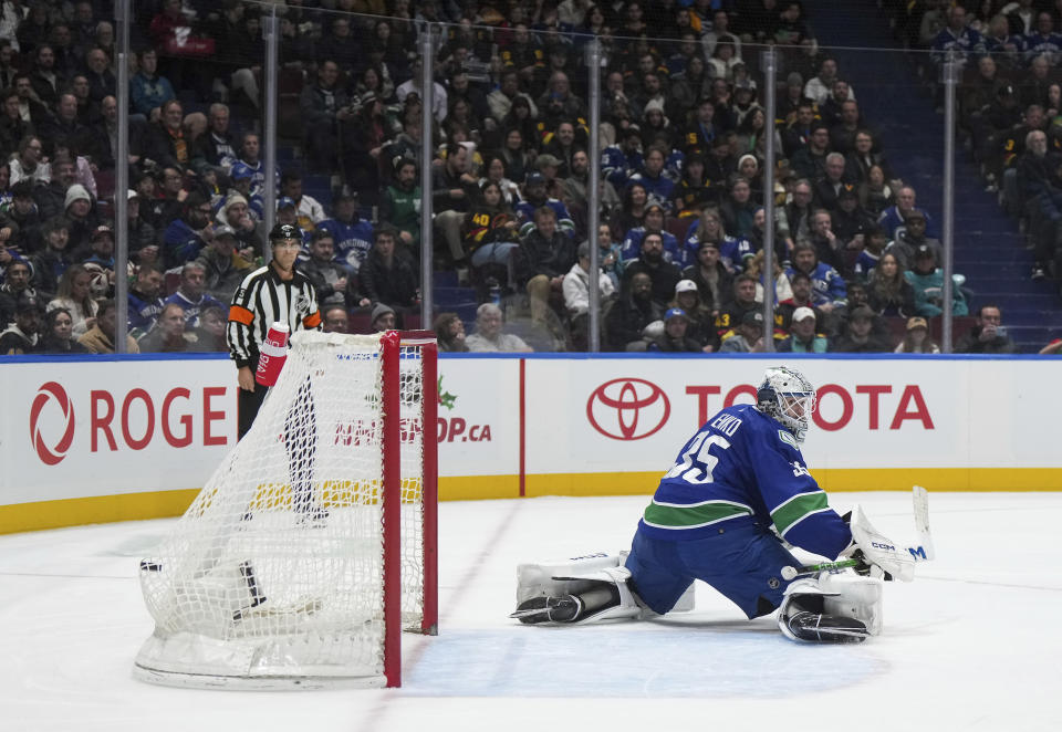 Vancouver Canucks goalie Thatcher Demko allows a goal to Vegas Golden Knights' William Karlsson during the second period of an NHL hockey game Thursday, Nov 30, 2023, in Vancouver, British Columbia. (Darryl Dyck/The Canadian Press via AP)