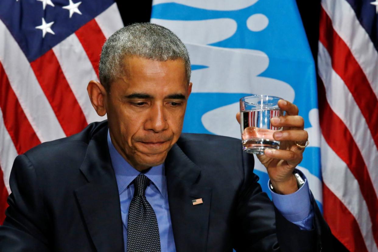 Image: U.S. President Barack Obama drinks a glass of filtered water from Flint, a city struggling with the effects of lead-poisoned drinking water, during a meeting will local and federal authorities in Michigan (Carlos Barria / Reuters file)
