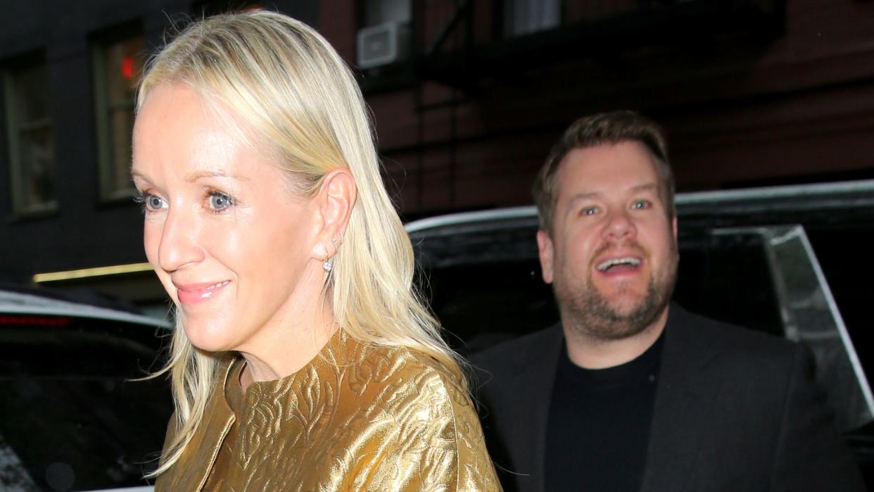 James Corden in New York City with wife Julia Carey wearing a gold mini dress coat
