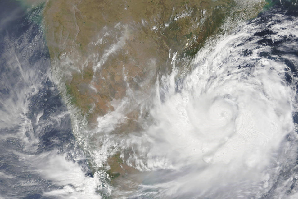 This Wednesday, May 1, 2019 photo provided by NASA shows a satellite view of Cyclone Fani. Indian authorities have evacuated hundreds of thousands of people along the country's eastern coast ahead of the cyclone moving through the Bay of Bengal. Meteorologists say Cyclone Fani could bring extremely severe wind and rain when it hits the Indian state of Odisha on Friday. (NASA via AP)