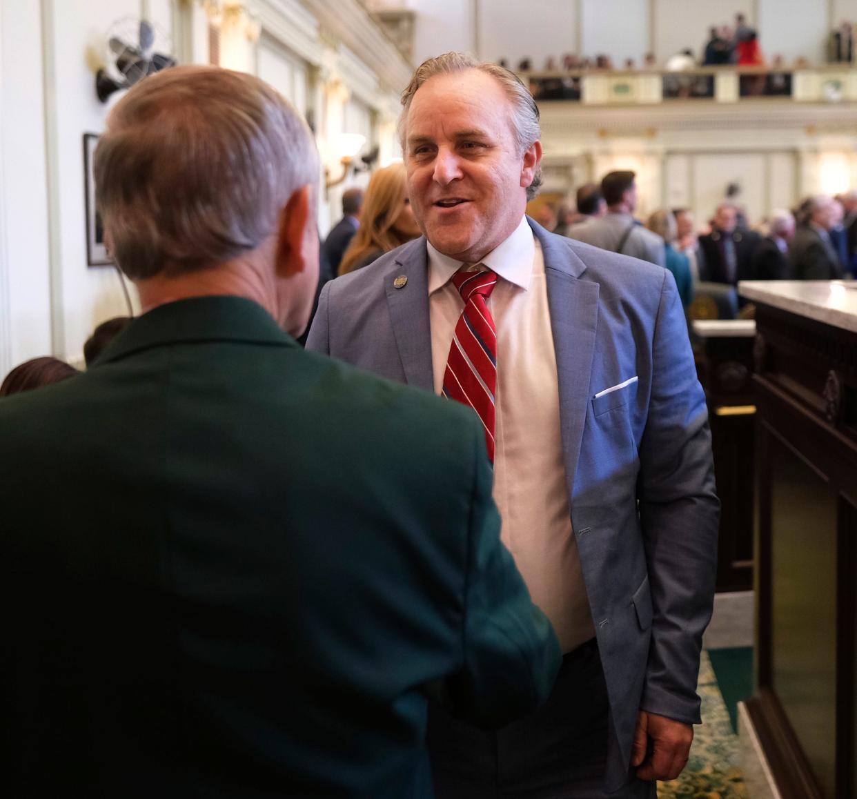 Senate President Pro Tempore Greg Treat greets a House Sgt. at Arms as he arrives for Gov. Kevin Stitt's State of the State address to the joint session on the first day of the Oklahoma Legislature Monday, Feb. 5, 2024