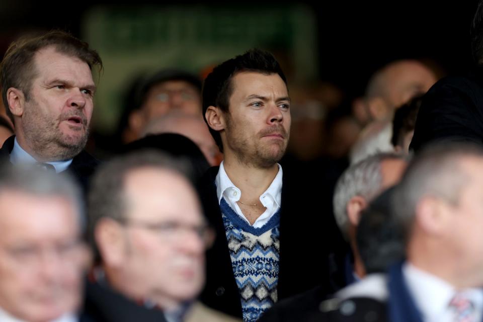 Styles takes in the game at Kenilworth Road (Getty Images)