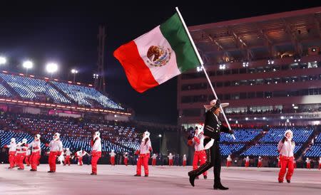 Pyeongchang 2018 Winter Olympics – Opening ceremony – Pyeongchang Olympic Stadium - Pyeongchang, South Korea – February 9, 2018 - German Madrazo of Mexico carries the national flag. REUTERS/Kai Pfaffenbach