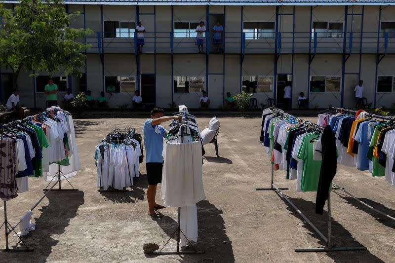 A drug rehab patient hangs laundry to dry at the Mega Drug Abuse Treatment and Rehabilitation Center, in Nueva Ecija province