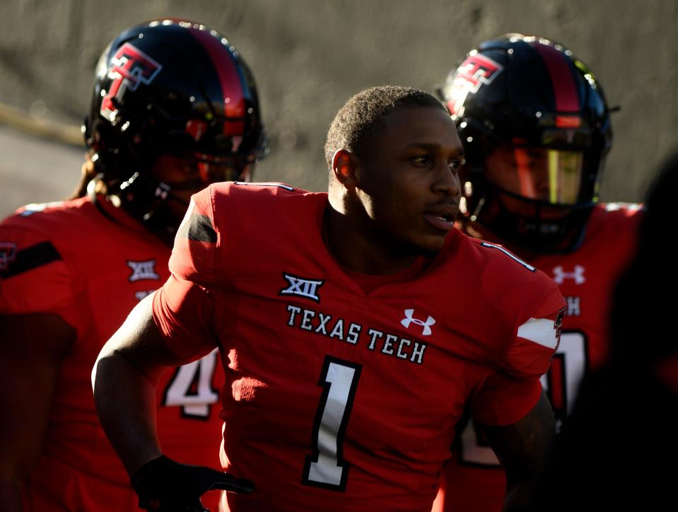 Texas Tech's wide receiver Myles Price (1) prepares to run out on to the field before the game against TCU, Thursday, Nov. 2, 2023, at Jones AT&T Stadium.