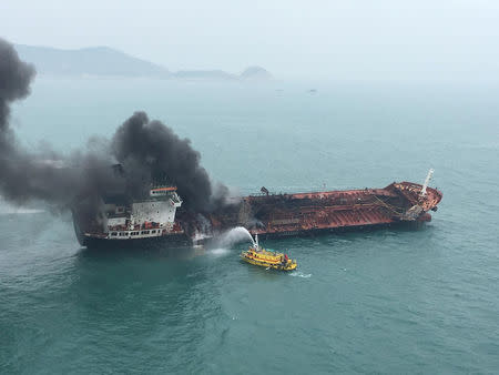 An oil tanker on fire is seen near Lamma island, Hong Kong, China January 8, 2019. Government Flying Service/Handout via REUTERS