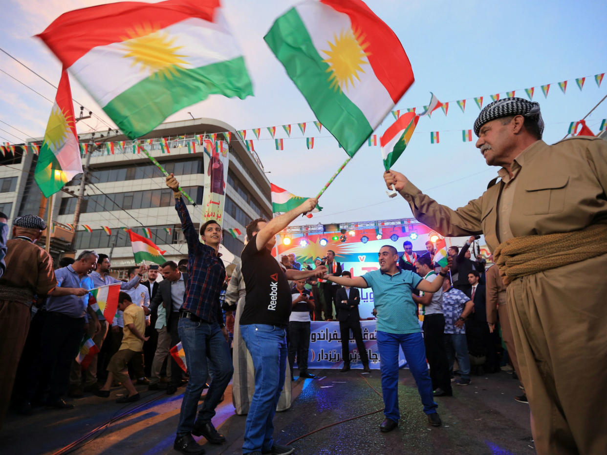 Kurds celebrate to show their support for the independence referendum in Duhok, Iraq: Ari Jalal/Reuters