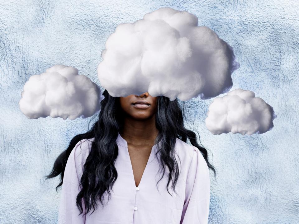 What Is Brain Fog? Brain Fog Meaning, Causes, and Fixes: clouds covering woman's face