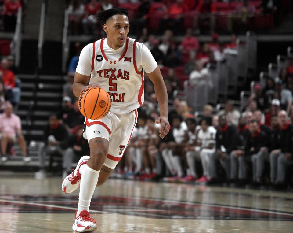 Texas Tech's guard Darrion Williams (5) dribbles the ball against Texas A&M-Commerce in the first home game of the season, Wednesday, Nov. 8, 2023, at United Supermarkets Arena.