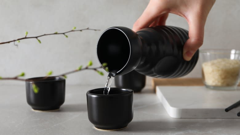 Pouring sake into cups