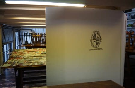 Informative materials on candidates of local political parties are seen at a polling station during primary elections ahead of the presidential elections later this year, in Montevideo