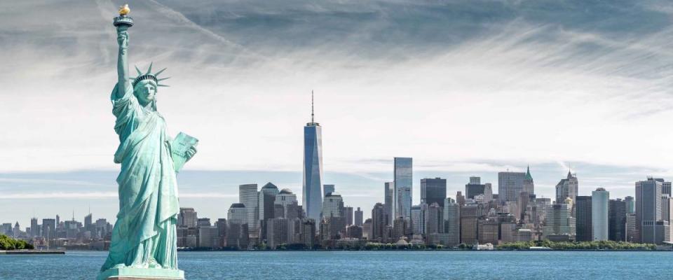 The Statue of Liberty with One World Trade Center background, Landmarks of New York City, USA