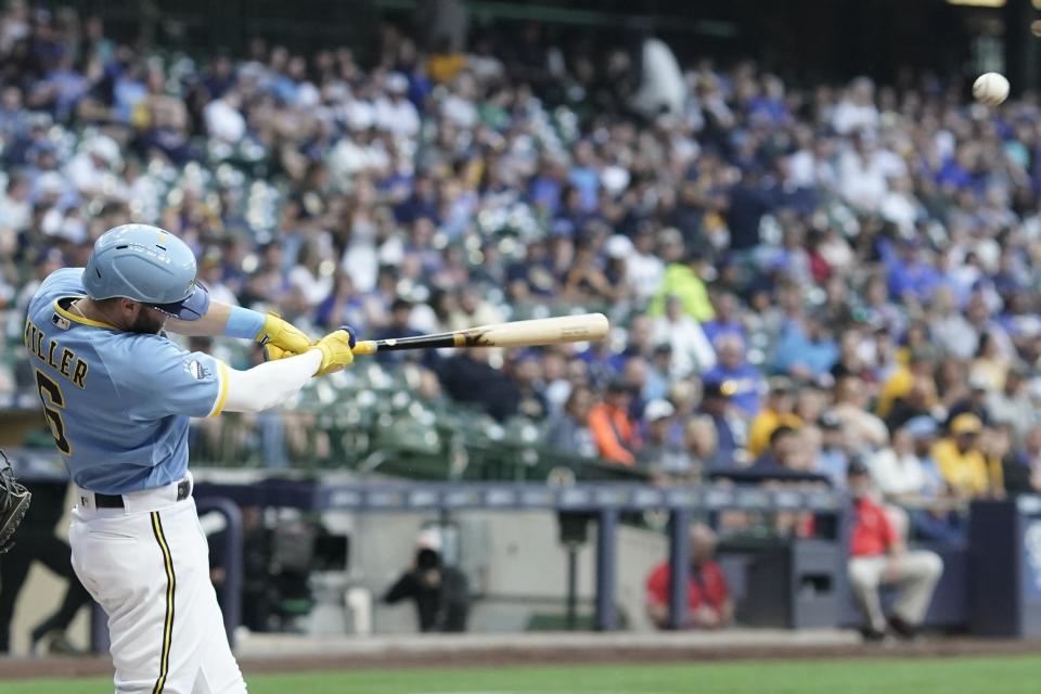 Milwaukee Brewers' Owen Miller hits a single during the first inning of a baseball game against the Oakland Athletics Friday, June 9, 2023, in Milwaukee. (AP Photo/Morry Gash)