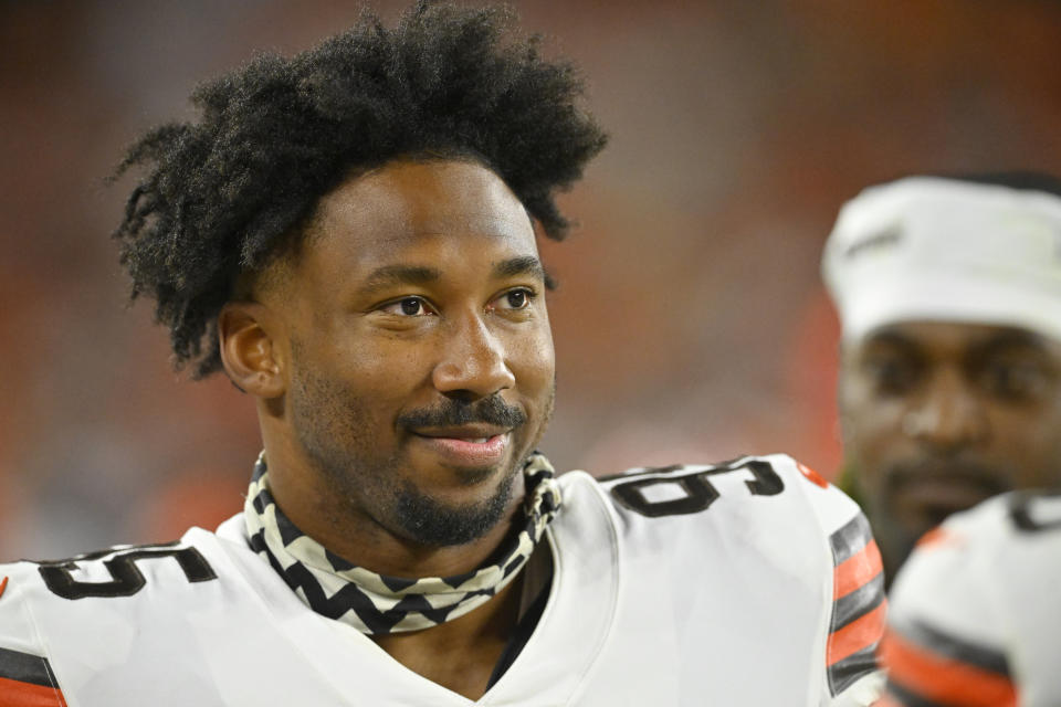 FILE - Cleveland Browns defensive end Myles Garrett stands on the field during an NFL preseason football game against the Chicago Bears, Saturday, Aug. 27, 2022, in Cleveland. Now, more focused, stronger and driven like never before to push himself beyond what he thought possible as he reaches a pivotal point in his NFL career, Garrett has his sights on a new target. He's seeking greatness. Iconic greatness. (AP Photo/David Richard, File)