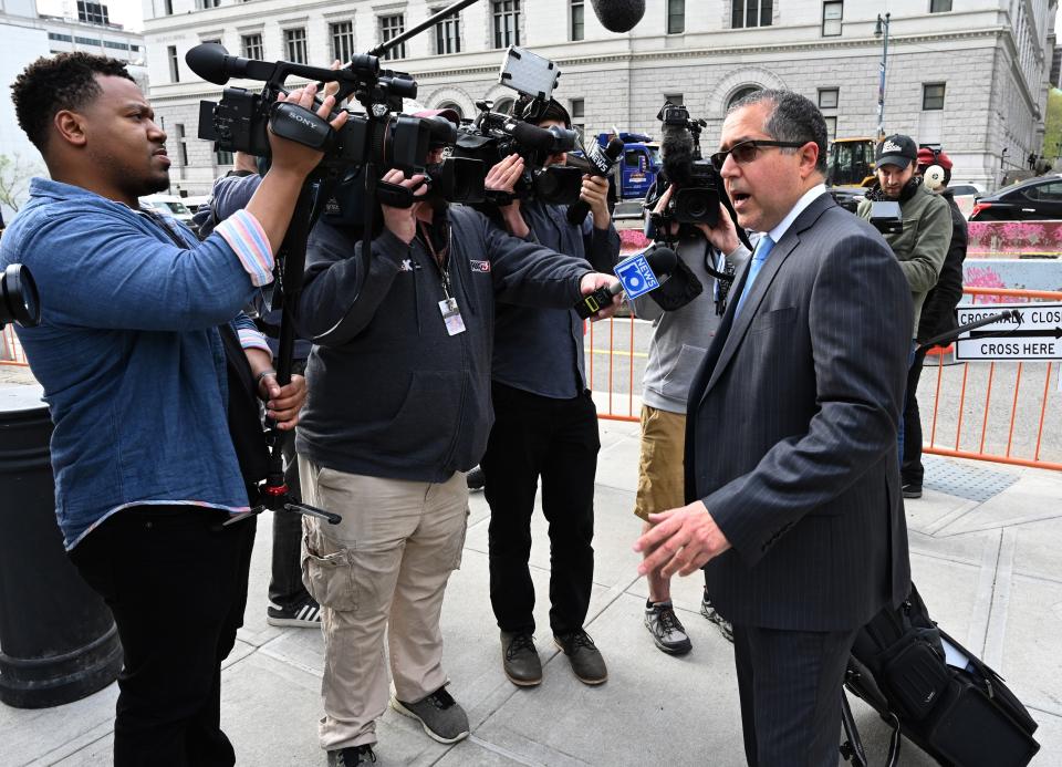 Marc Agnifilo, the new attorney for Sean "Diddy" Combs, addresses reporters in 2019 outside federal court in Brooklyn, where he was representing NXIVM cult leader Keith Raniere.