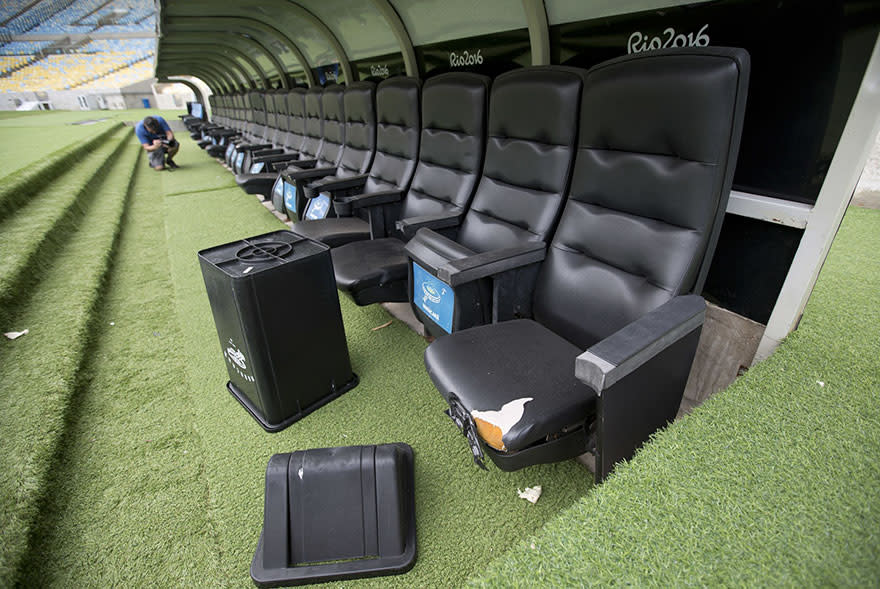 <p>Seats in the dugout have been left in disrepair (Silvia Izquierdo) </p>