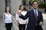 In this Monday, July 8, 2019 photo, lawyer Brad Edwards, right, leaves federal court with his clients Michelle Licata, left, and Courtney Wild, center, after wealthy financier Jeffrey Epstein appeared for his arraignment in New York. Licata and Wild, two of Epstein's accusers, say they feel empowered after he was charged with sex trafficking and conspiracy charges. Epstein pleaded not guilty to the charges and will remain jailed until at least July 15 when a bail hearing is set on the case. (AP Photo/Seth Wenig)