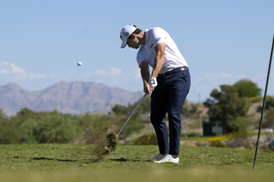 Patrick Cantlay takes his second shot on the sixth hole during the final round of the Shriners Children's Open golf tournament, Sunday, Oct. 9, 2022, in Las Vegas. (AP Photo/David Becker)