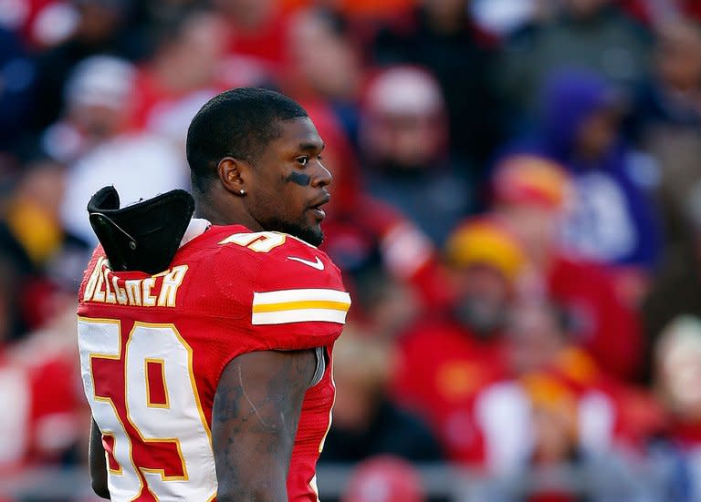 Inside linebacker Jovan Belcher of the Kansas City Chiefs walks off the field during his final game, against the Denver Broncos on November 25, 2012. Days later Belcher used a .40-calibre handgun to kill his girlfriend, Kasandra Perkins, in their home. Belcher then drove to the Chiefs' Arrowhead Stadium, where he used a different handgun to kill himself