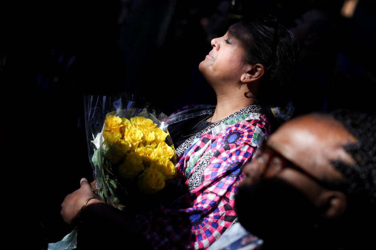 A family member of a victim of the 9/11 attacks attends a ceremony marking the 23rd anniversary of the attacks.