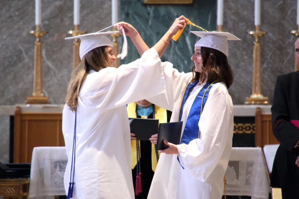 Graduates of the Mount Saint Mary Academy Class of 2022 turn the tassels of their fellow classmates during the Saturday, June 4, commencement ceremony, which was attended by Metuchen Bishop James F. Checchio.