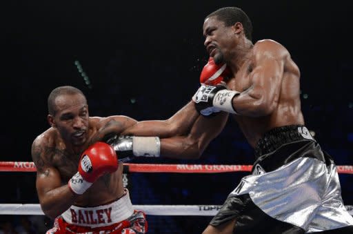 Randall Bailey (L) and Mike Jones exchange punches during their IBF welterweight title fight on June 9. Bailey lived up to his reputation as a power puncher with an 11th-round knockout of previously unbeaten Jones in a fight for the vacant IBF welterweight title