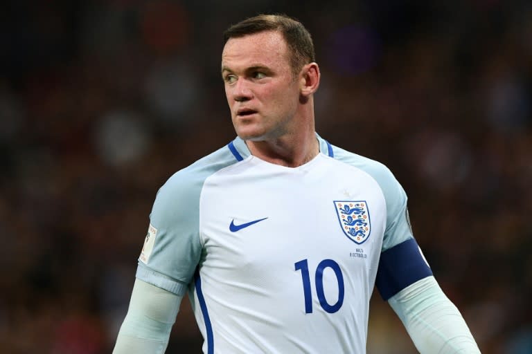 England captain Rooney was pictured looking bleary-eyed and mingling with guests from a wedding reception at the England team hotel after their World Cup qualifier against Scotland last month