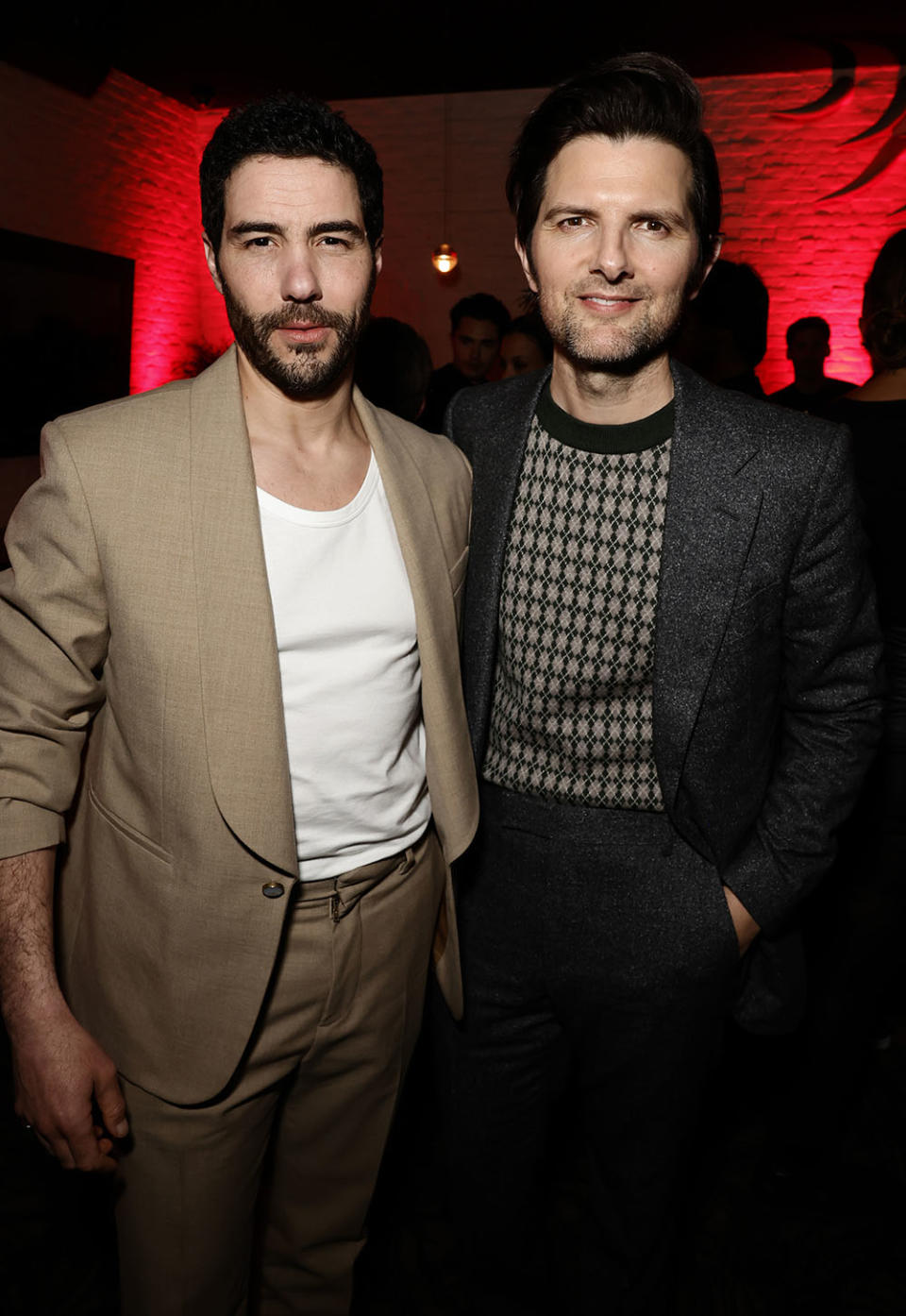 Tahar Rahim, Adam Scott, attend the World Premiere of Sony Pictures' "Madame Web" after party held at STK Steakhouse on February 12, 2024 in Los Angeles, California.