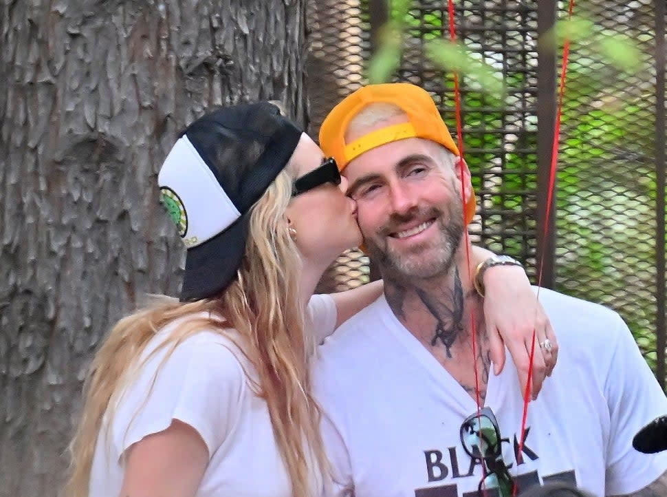 Behati Prinsloo Kisses Adam Levine on His 44th Birthday at Disneyland 