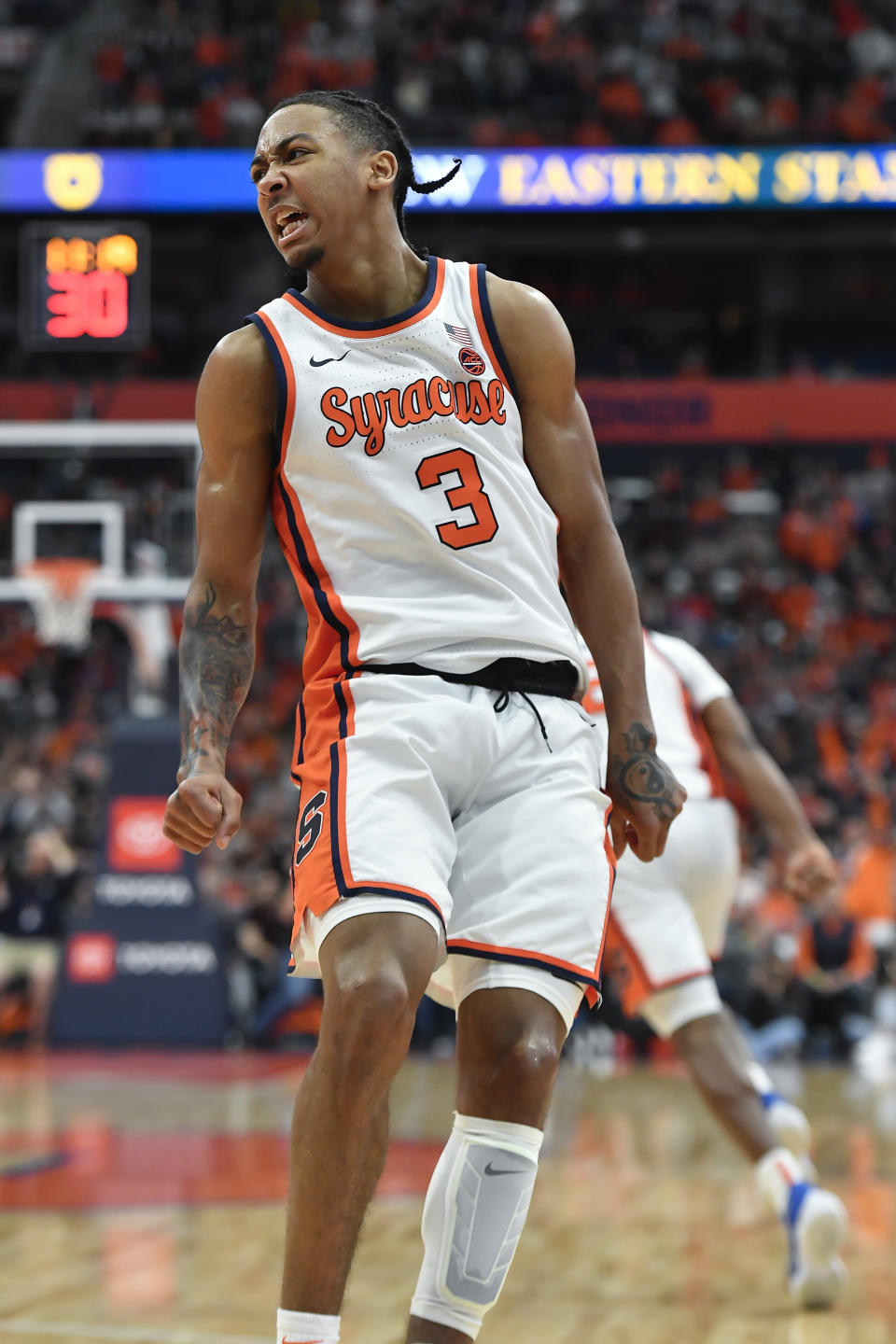 Syracuse guard Judah Mintz (3) reacts after scoring during the second half of an NCAA college basketball game against Pittsburgh in Syracuse, N.Y., Saturday, Dec. 30, 2023. (AP Photo/Adrian Kraus)