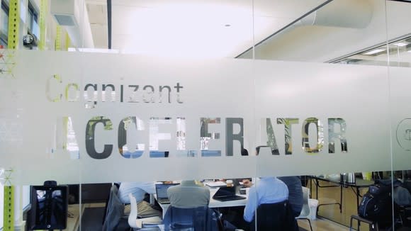 Glass wall with Cognizant Accelerator etched on it.