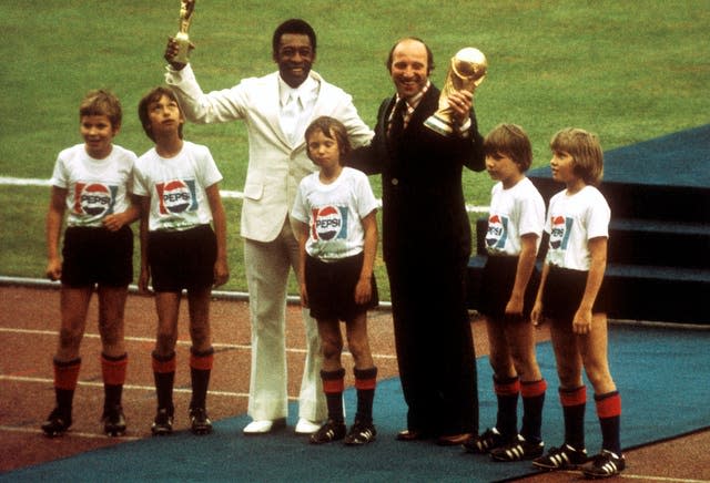 Pele is joined by former West Germany striker Uwe Seeler during the opening ceremony of the 1974 World Cup at the Waldstadion in Frankfurt. The prolific pair played at the same four World Cups - 1958, 1962, 1966 and 1970 - before finishing their international careers